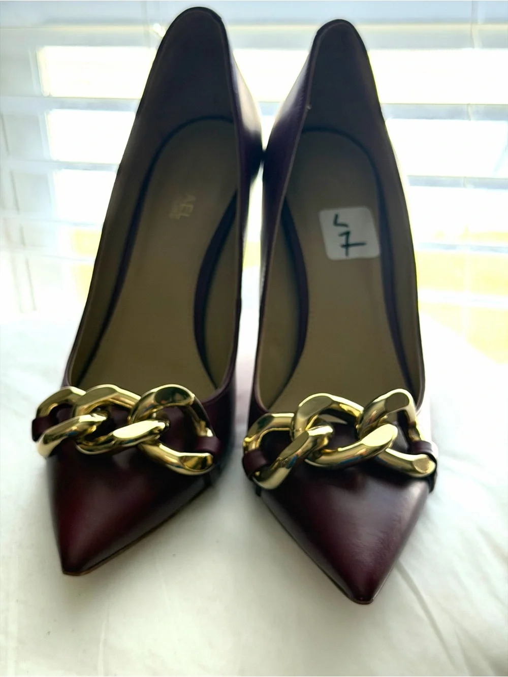 Michael Kors Burgundy Pointed Toe Pumps with Gold Chain Accent